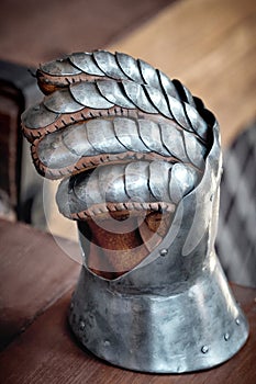 Closeup of an antique steel knight glove.