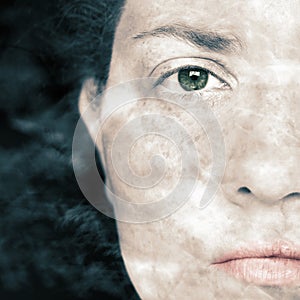 Closeup Artistic Portrait of Woman and with Smoke Superimposed Over Her Face
