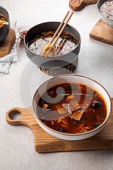 Closeup on asian chinese spicy noodle soup