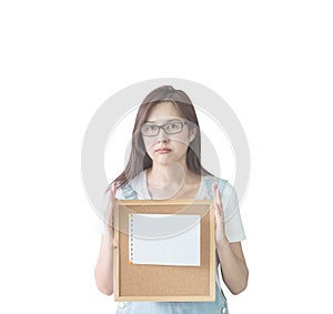 Closeup asian woman with cork board in hand with boring face isolated on white background with clipping path