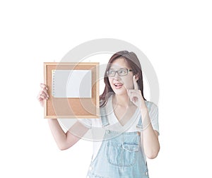 Closeup asian woman with cork board in hand with have an idea face isolated on white background with clipping path