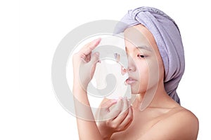 Closeup Asian young woman face, girl removing facial peel off mask isolated on white