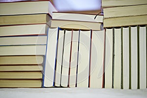 Closeup of an assortment of back of books, modern living