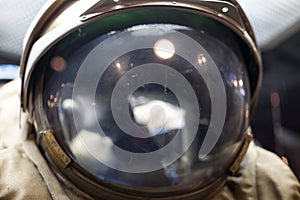 Closeup of astronaut helmet with reflections. Space and exploring
