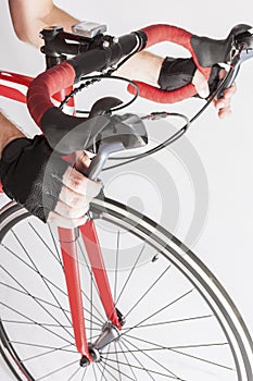 Closeup of Athlete Hands in Gloves Holding Dual Controls Levers