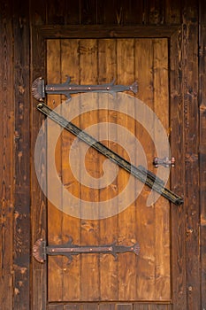 Closeup authentic locked wooden door