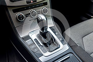 Closeup of automatic transmission inside car salon