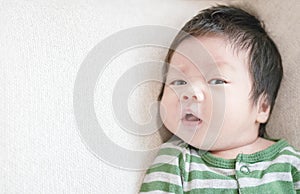 Closeup a baby on the bed with copy space