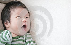 Closeup a baby on the bed with copy space