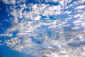 Bright blue sky and cotton clouds with sun lights on afternoon summer