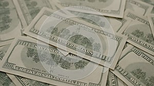 Closeup background of US Currency in 100 dollar banknotes