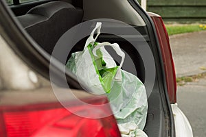 Closeup of a bag at the  in an open car trunk