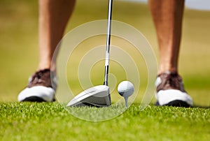 Closeup of ball, athlete and club on golf course in contest, competition challenge and target training. Golfer, grass