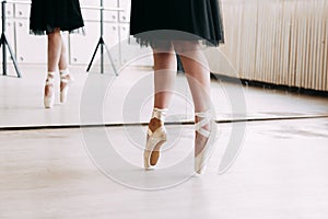 Closeup of ballerina feet in pointe shoes