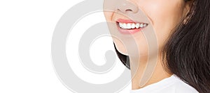 Closeup banner smiling asian woman mouth and white healthy teeth with whitening treatment isolated on white background. Dental
