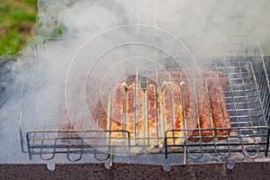 Closeup barbeque sausages outdoors