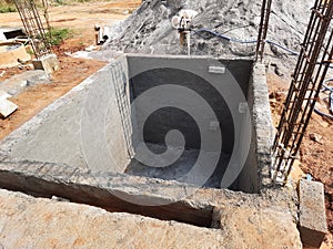 Closeup of basic or first work or building construction like, sump, pillar, beam, and paya with materials m sand, stones, boras