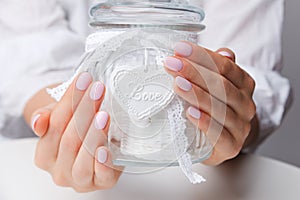 Closeup of beautiful baby pink nails