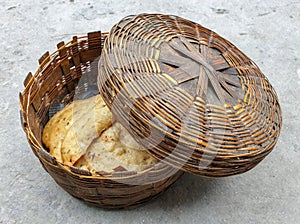 Closeup of beautiful bamboo bread, roti basket with fried roti and selective focus in Himachal pradesh