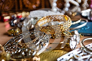Closeup of beautiful costume jewelry, earrings, beads, bracelets and rings