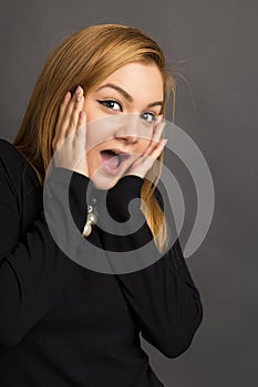 Closeup of beautiful girl with astonished expression