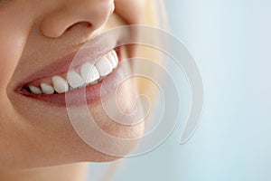 Closeup Of Beautiful Smile With White Teeth. Woman Mouth Smiling