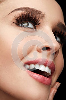 Closeup Of Beautiful Smiling Female Face With Perfect Makeup
