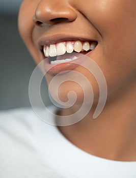 Closeup of beautiful toothy female smile