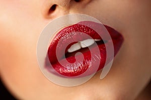 Closeup Beautiful Woman Lips With Red Lipstick. Beauty Makeup