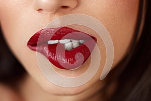 Closeup Beautiful Woman Lips With Red Lipstick. Beauty Makeup photo