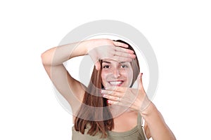 Closeup of beautiful woman making frame with her hands