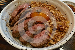 closeup beef slice bowl rice with egg