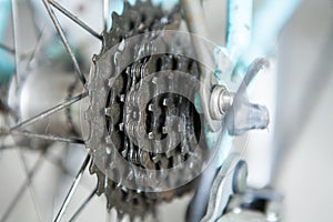 Closeup of a bicycle gears mechanism and chain on the rear wheel