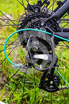 Closeup of a bicycle gears mechanism and chain on the rear wheel of mountain bike.