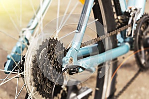 Closeup of a bicycle gears mechanism and chain on the rear wheel of mountain bike.