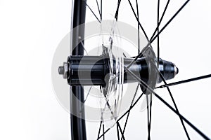 Closeup of a bicycle hub, spoke and rim