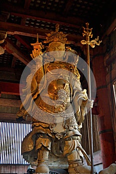 Closeup of a big Bodhisattva statue in the Todai Ji temple