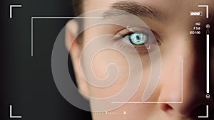 Closeup biometrical vision scanning system inspecting woman eye identifying