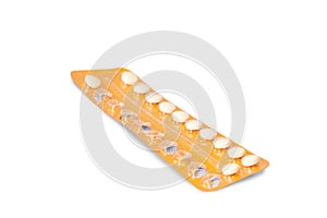 Closeup of birth control pills in a partly used blister pack