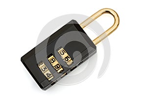 Closeup of a black and gold combination lock isolated on white