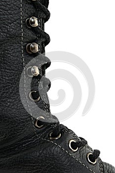 Closeup of black leather boot