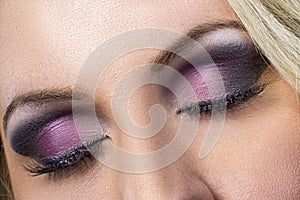 Closeup of black and purple smokey eye