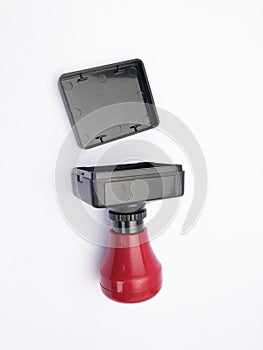 closeup black red plastic stamp