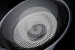 Closeup of a black speaker sub woofer photo
