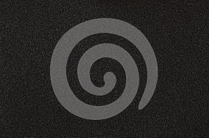 Closeup of black textured plastick surface