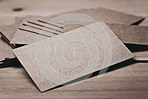 Closeup of blank business cards on wood table. Horizontal