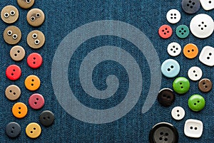 Closeup blue jeans background with buttons.