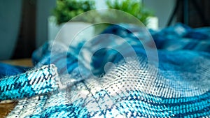 Closeup of a blue knitted texture