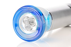 Closeup of a blue LED flashlights