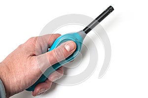 Blue lighter in hand on white background
